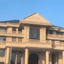 南阳黄金麻别墅外墙干挂石材效果示例