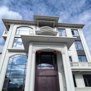 南阳白麻别墅外墙干挂石材效果示例