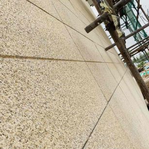 南阳 黄金麻花岗岩荔枝面外墙干挂石材效果示例