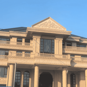 南阳黄金麻别墅外墙干挂石材效果示例