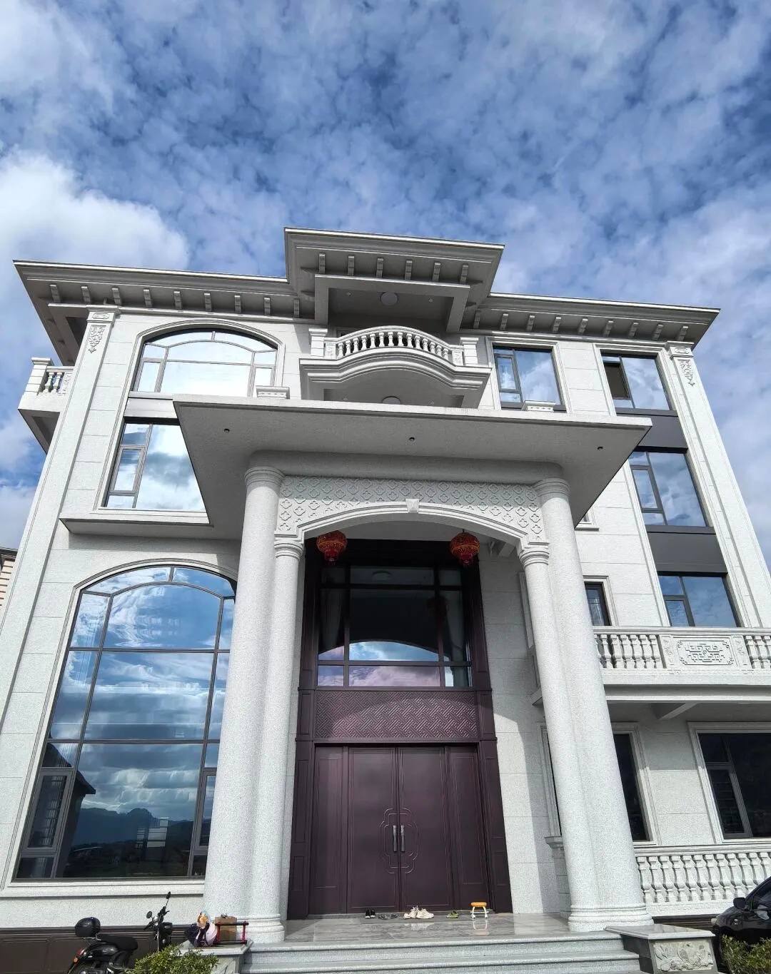 南阳白麻别墅外墙干挂石材效果示例